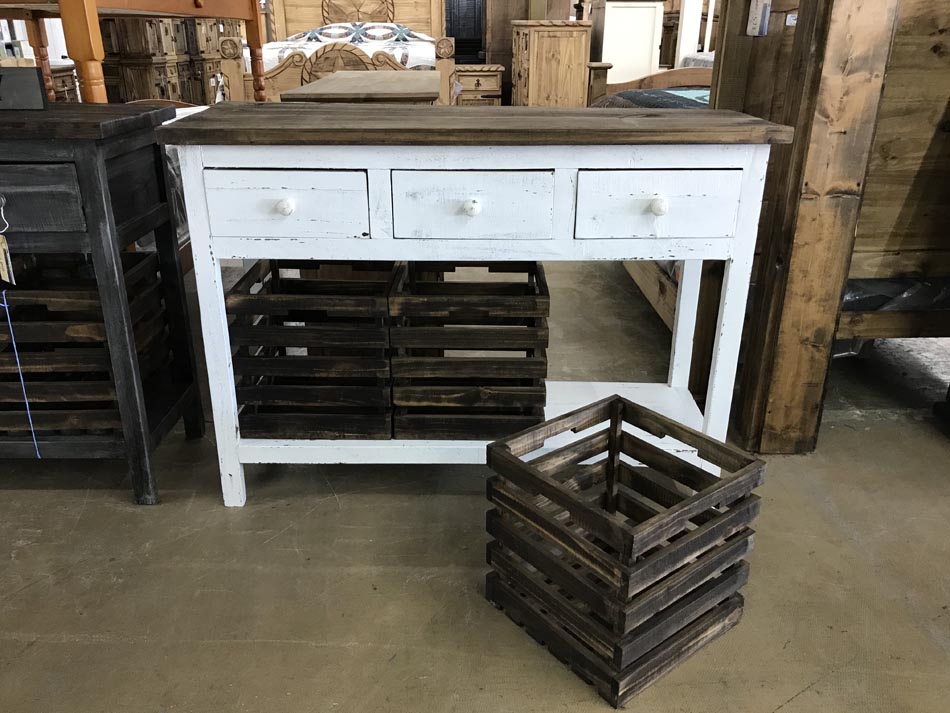 Rustic white crate basket storage table, with three drawers and 3 pull-out crates, with one crate on floor to show versatility.