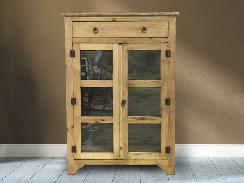 Rustic glass-pane door storage cabinet, in light honey finish.