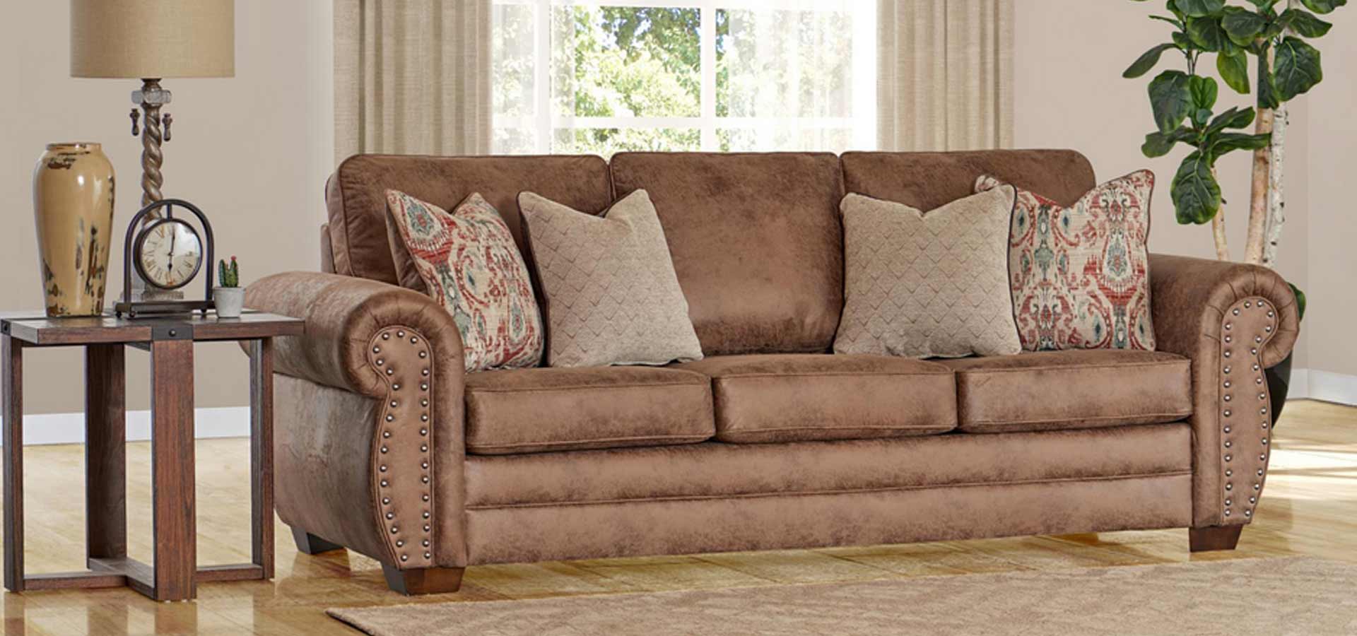 A beautiful traditional-style sofa & other furniture in a living room much like in Lubbock, Texas.