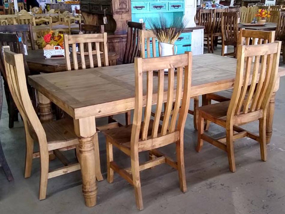 Beautiful rustic pine dining room table in warm honey finish, with six chairs.