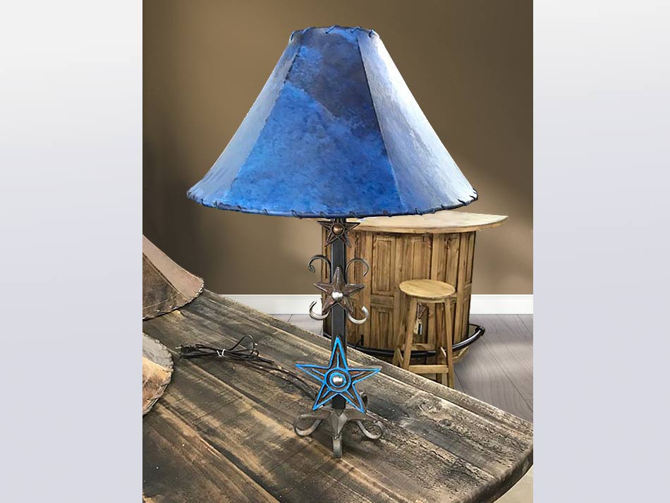 Striking blue star table lamp, perfect for pairing with rustic furniture.