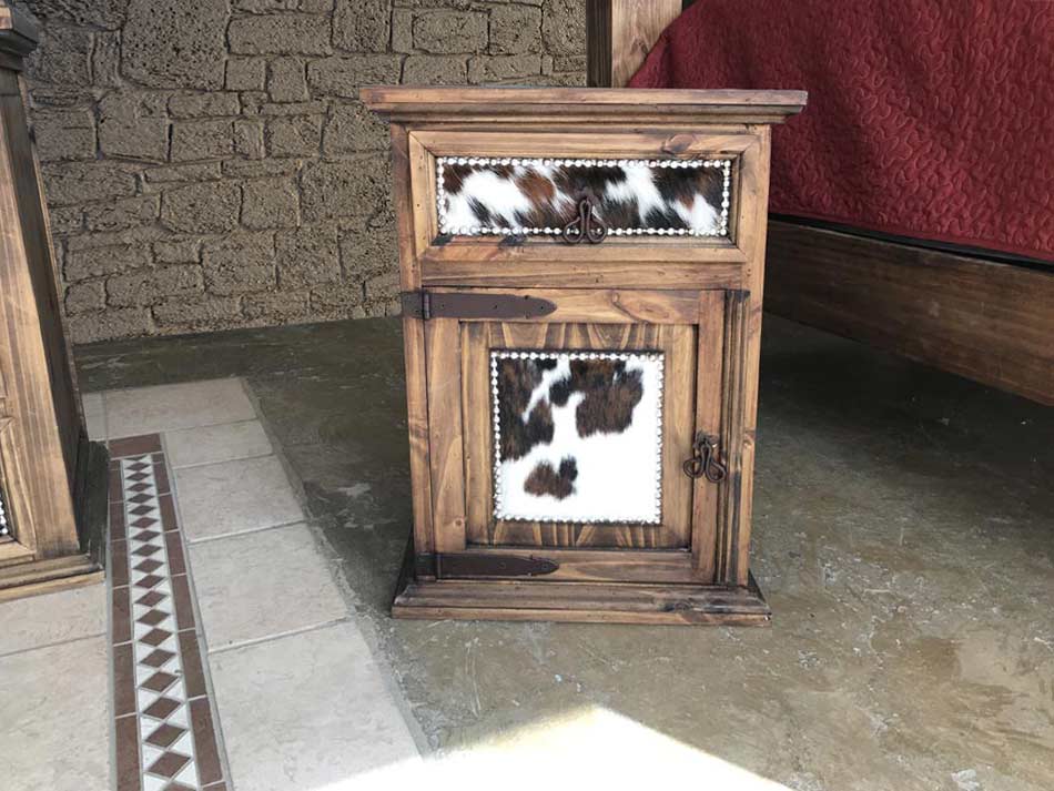 Hair-on hide nightstand with hand-crafted iron hardware, available in Lubbock.