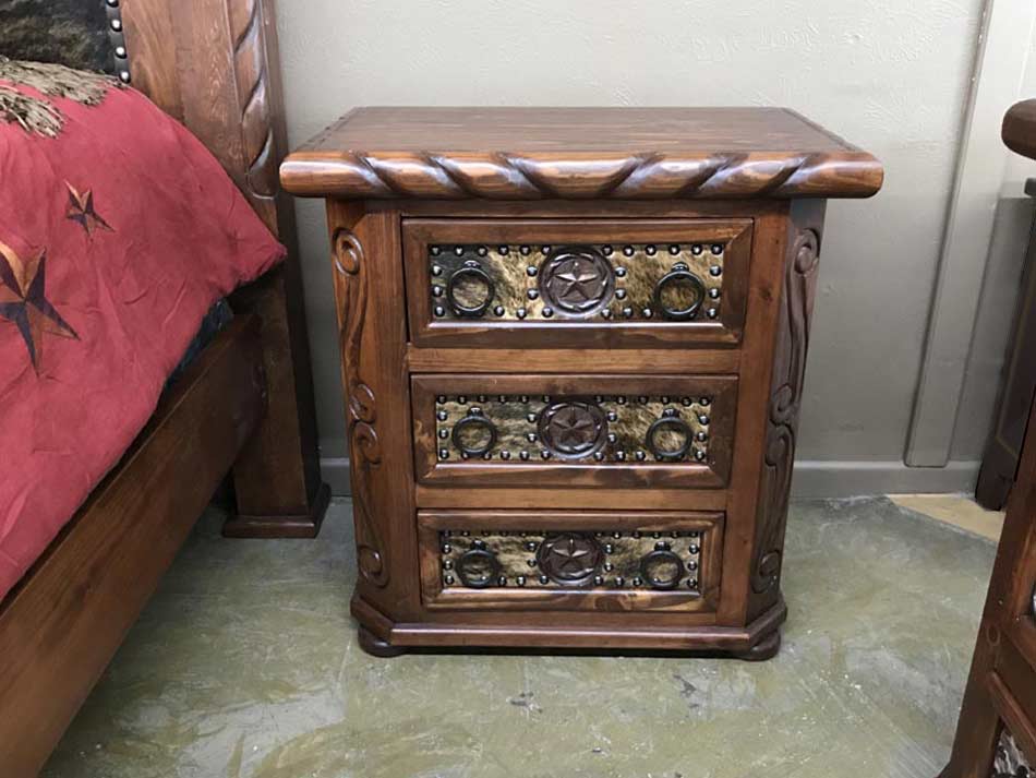 Detailed "lone star" nightstand, with accents and hair-on hide.