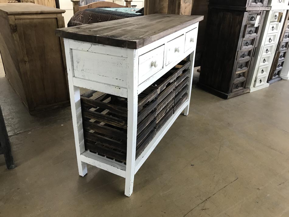 side view of rustic white crate basket storage table, with three drawers and 3 pull-out crates, available in Lubbock.