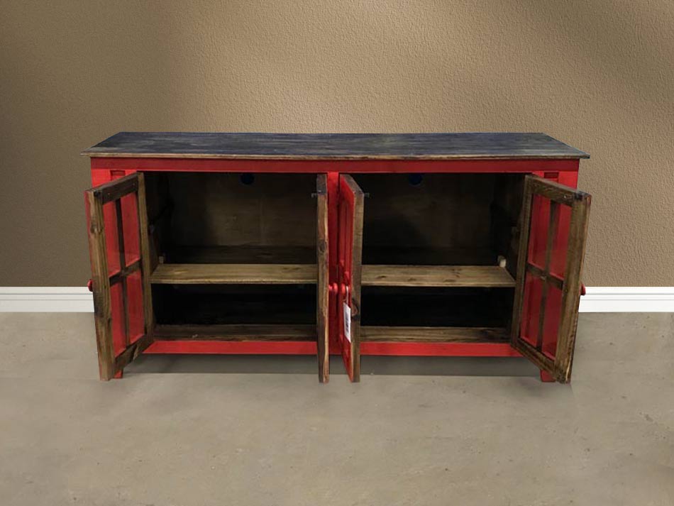 Striking red rustic furniture entertainment center, with glass pane cabinet doors open, revealing ample storage space.