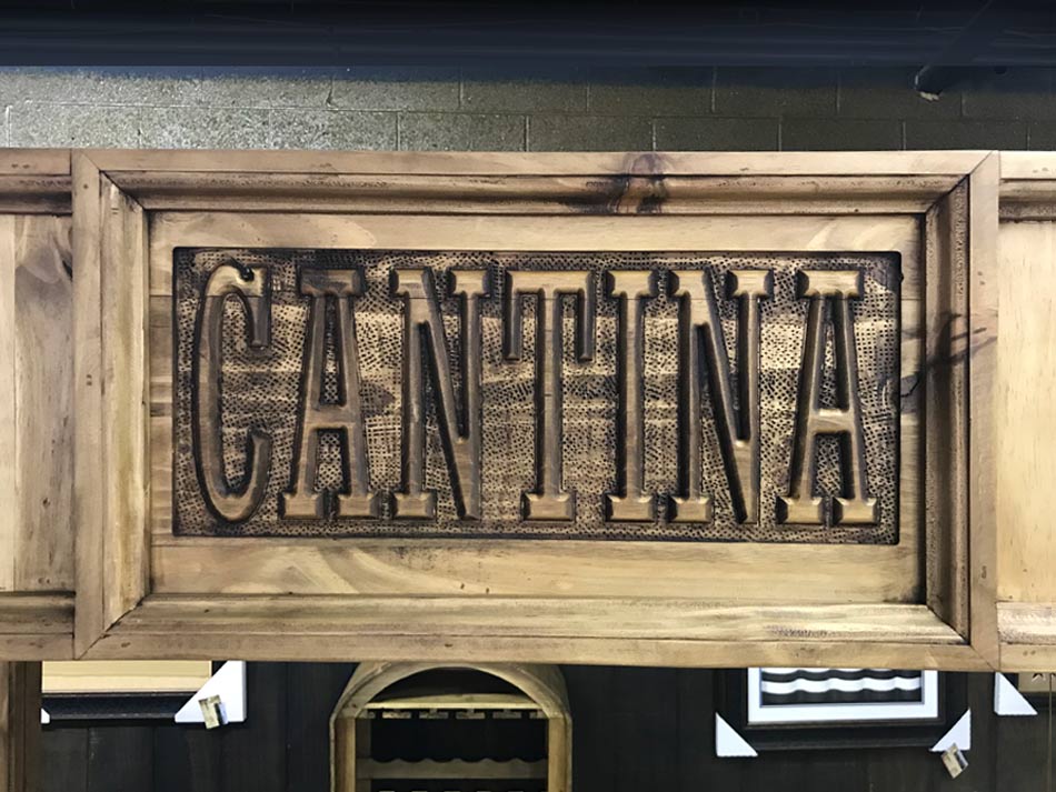 Bar available in Lubbock which features a carved "Cantina" sign over the front.